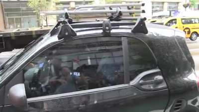 Shaquille O'Neal seen driving a car around NYC