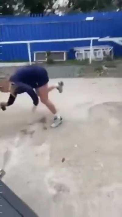 Playing pretend football near a propane tank