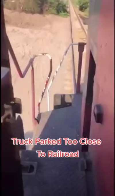 Truck Parked Too Close To Railroad