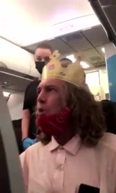 WS Racist wearing Burger King crown on plane goes into a rage