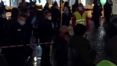 German police measuring social distances in public with large rulers