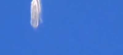 UFO filmed 'shapeshifting' at 30,000 ft from airplane window - 2021