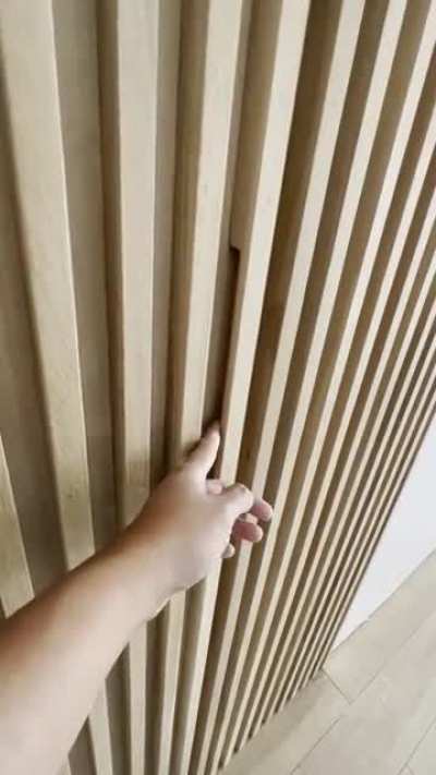 Just finished this hidden door for my house. I used rift sawn white oak slats on a rift sawn white oak plywood panel.