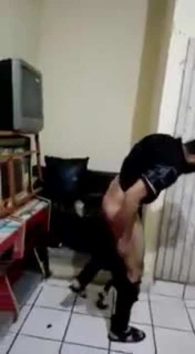thief gets his ass beat with a wooden plank, shits himself