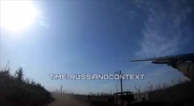 Russian soldiers try to shoot down an FPV drone with shotguns, but the vehicle they were in ends up being hit. Donetsk region, Ocheretyne. July 2024. 