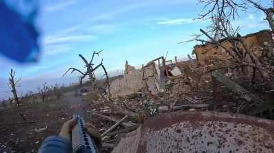 Ukrainian Soldiers using disposable rpgs and grenade launchers are unable to stop a Russian convoy heading towards a neighboring village. Music from source