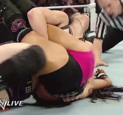 Paige showing off AJ's ass and legs