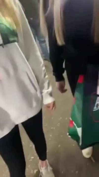 A group of teens bother a trans woman in a parking garage.