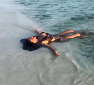 Salma Wearing a Leopard Print Swimsuit - Instagram January 2019