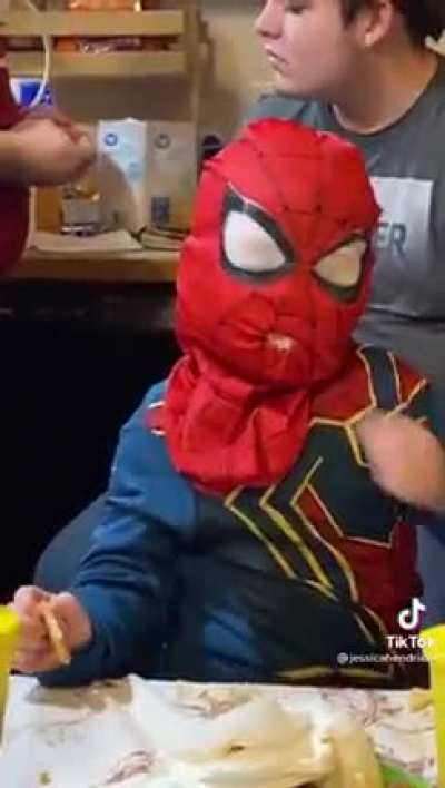 Spiderman eats cookies