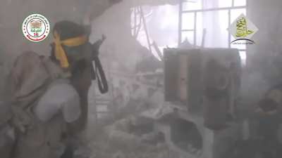 FSA fighters trade fire with SAA forces amidst the rubble of an Aleppo factory - 7/19/2015