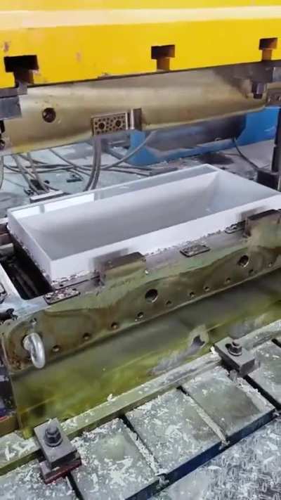 Compression molding a wash-basin