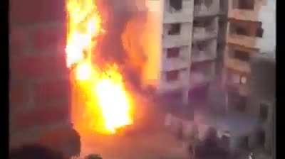 The fuel tank explodes in a car that was torched in the street