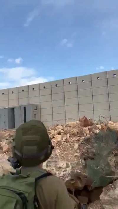 IDF soldier fire a flaming arrow across the border with Lebanon