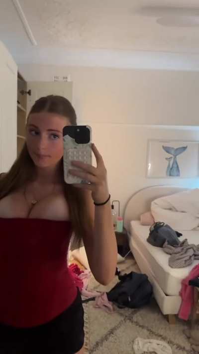 Tall, tan-lined redhead