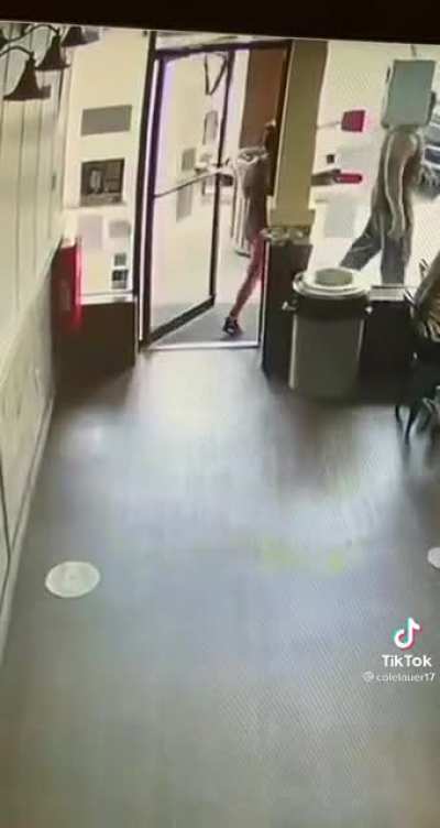 Angry man has a freakout and breaks a door after being told to wear a mask.