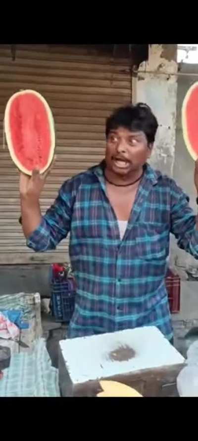 This fruit vendor has a crazy way of selling fruits.