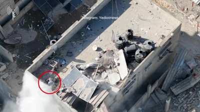 IDF drone footage of Hamas fighters being shot on a roof in northern gaza