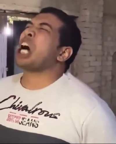 Guy Eats Burning Coal