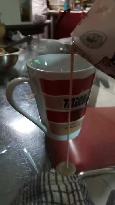 To film a video of pouring a drink