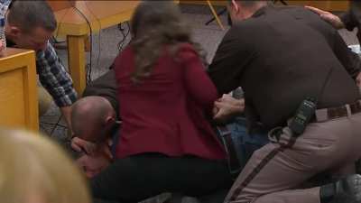 Father of victims lunges at convicted rapist Dr. Larry Nassar in court