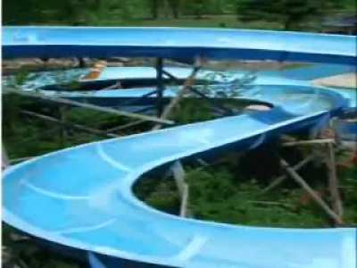 Cat goes down water slide