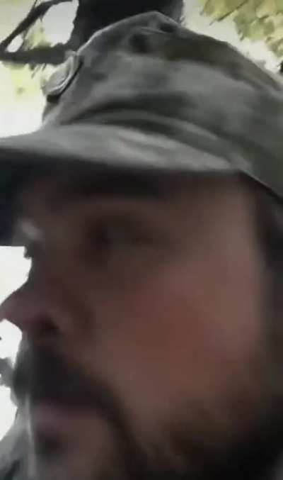 Ukranian soldier stuck with a bear