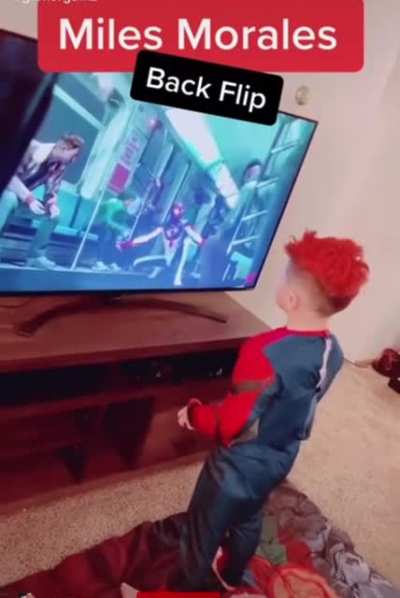 Proud Dad recording his son.