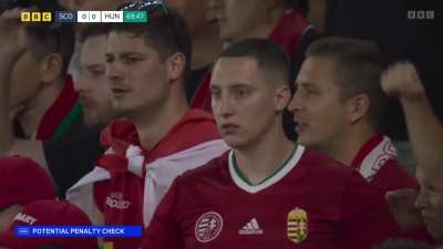 Footballer falls when try to stop a freekick