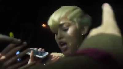 Miley let&rsquo;s some lucky fans touch her hot body