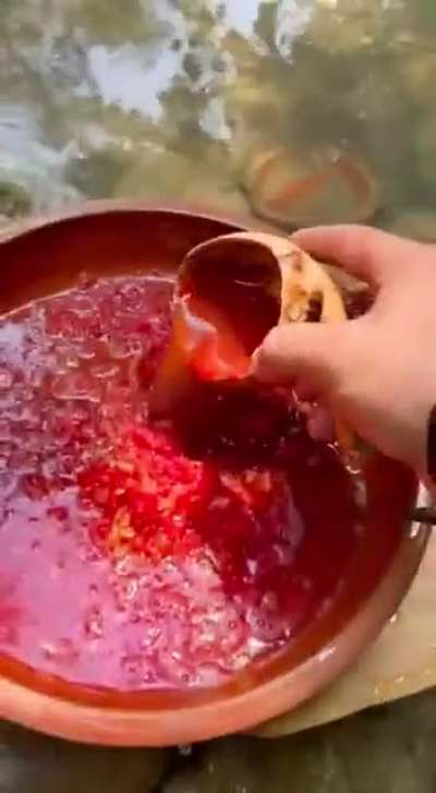 Man cooks a delicious meal in the forest...