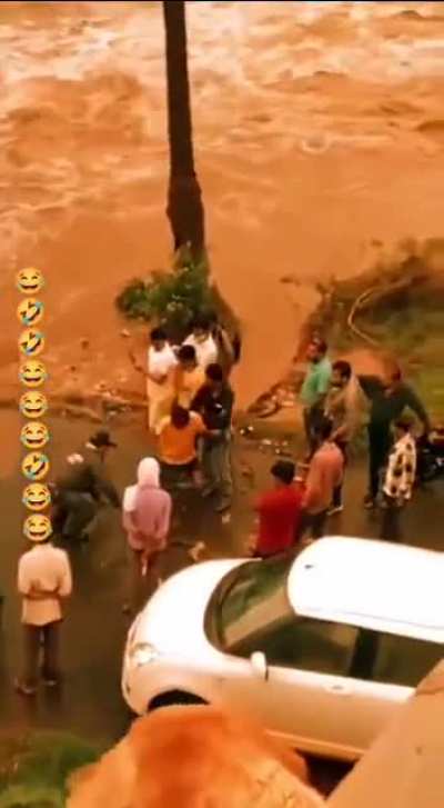 Casually crossing a flooded street