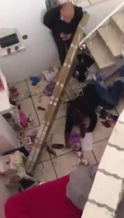 Guy refused to hire an electrician and proceeded to work with the ladder placed on the staircase
