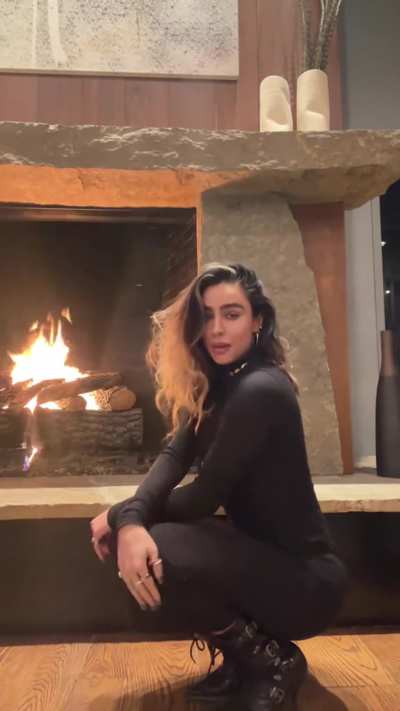 Dancing in black outfit, TikTok December 2023