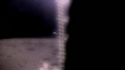 A crescent Earth seen from Apollo 12 lunar orbit 51 years ago