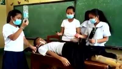 Filipino kids performing surgery