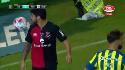 Newell's Old Boys player Pablo P&eacute;rez destroys a drone that carries a banner mocking his team.