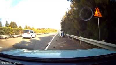 An suv is trying to exit from the passing lane