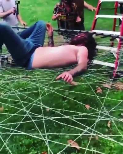 landing on a barbed wire trampoline