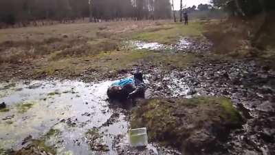 2 girls and a puddle.