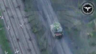 russian bmp covered in metal sheets gets tracked and abandoned