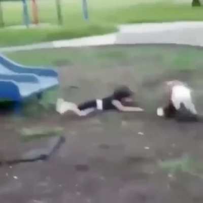 Chad shows kid how to properly use a slide