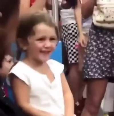 The little girl was crying on the subway so this group of guys started singing baby shark to cheer her up....