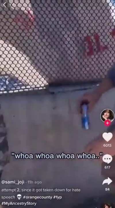 White supremacists confront man taking down their highway overpass sign in Irvine, CA.