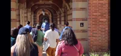 Kid harrasses people on UCLA campus for content