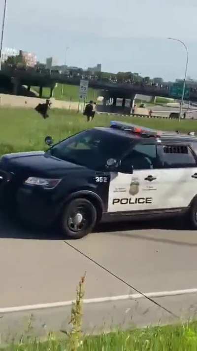 Minneapolis cops pepper spraying people out of moving squad cars
