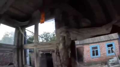 Ukrainian soldier throws a grenade that wounds a russian soldier, and then he finishes him of with his AK