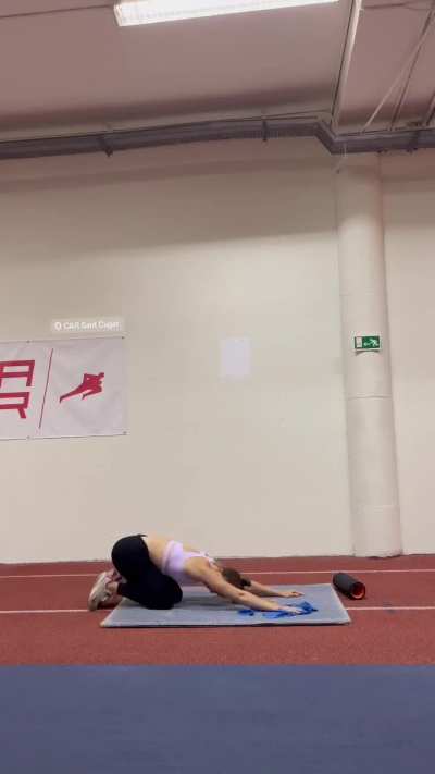 Clara stretching in tight spandex