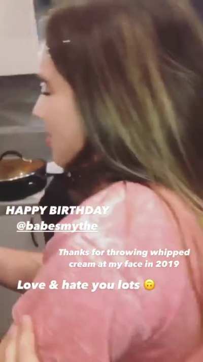 Whipped cream on her face