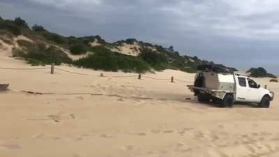 Taking the Maserati for a spin on the beach